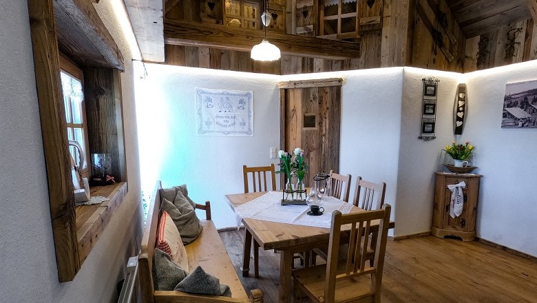 Rustic rooms provide a unique flair, © GO Pro Peter-10 Rustic dining room with wooden furniture and cozy decoration.
